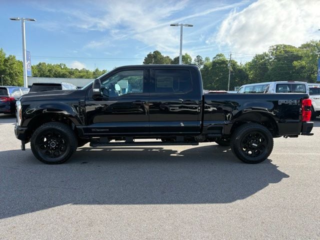 2026 Ford Super Duty F-350 Lariat in Agate Black Metallic — front three-quarter view