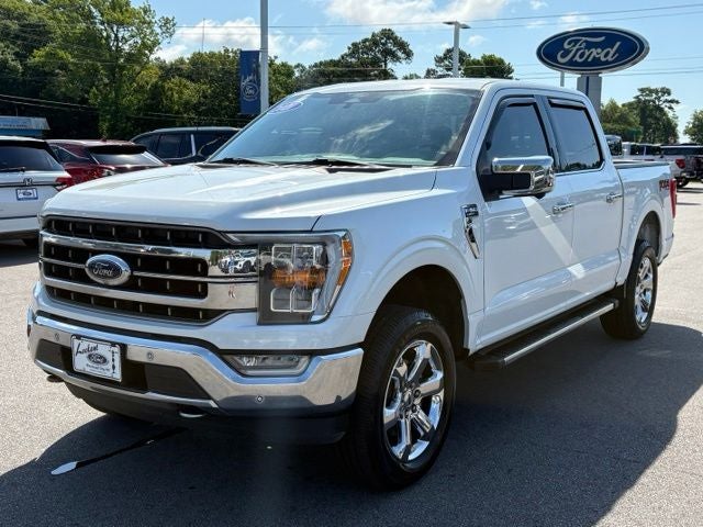 2021 Ford F-150 Lariat in White Metallic — front three-quarter view