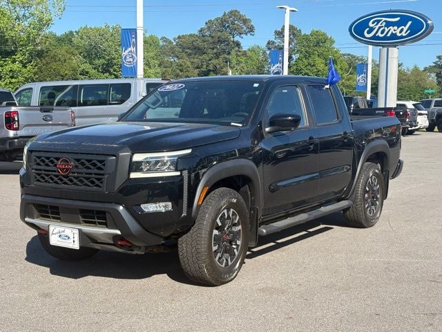 2022 Nissan Frontier PRO-4X in Black — front three-quarter view