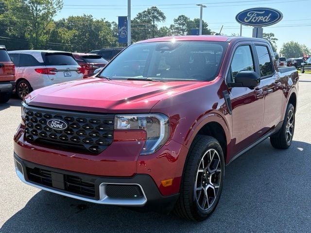 2026 Ford Maverick Lariat in Ruby Red Metallic Tinted Clearcoat — front three-quarter view