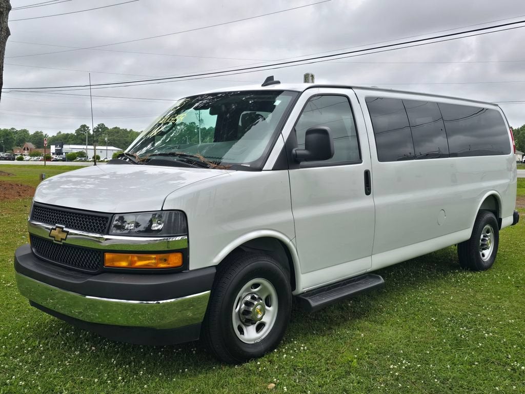 2025 Chevrolet Express Passenger 1LT in Summit White — front three-quarter view