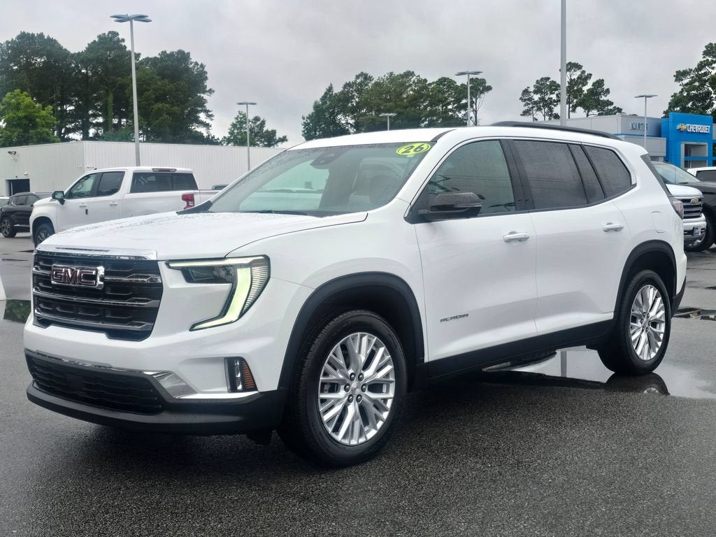 2026 GMC Acadia Elevation in Summit White — front three-quarter view