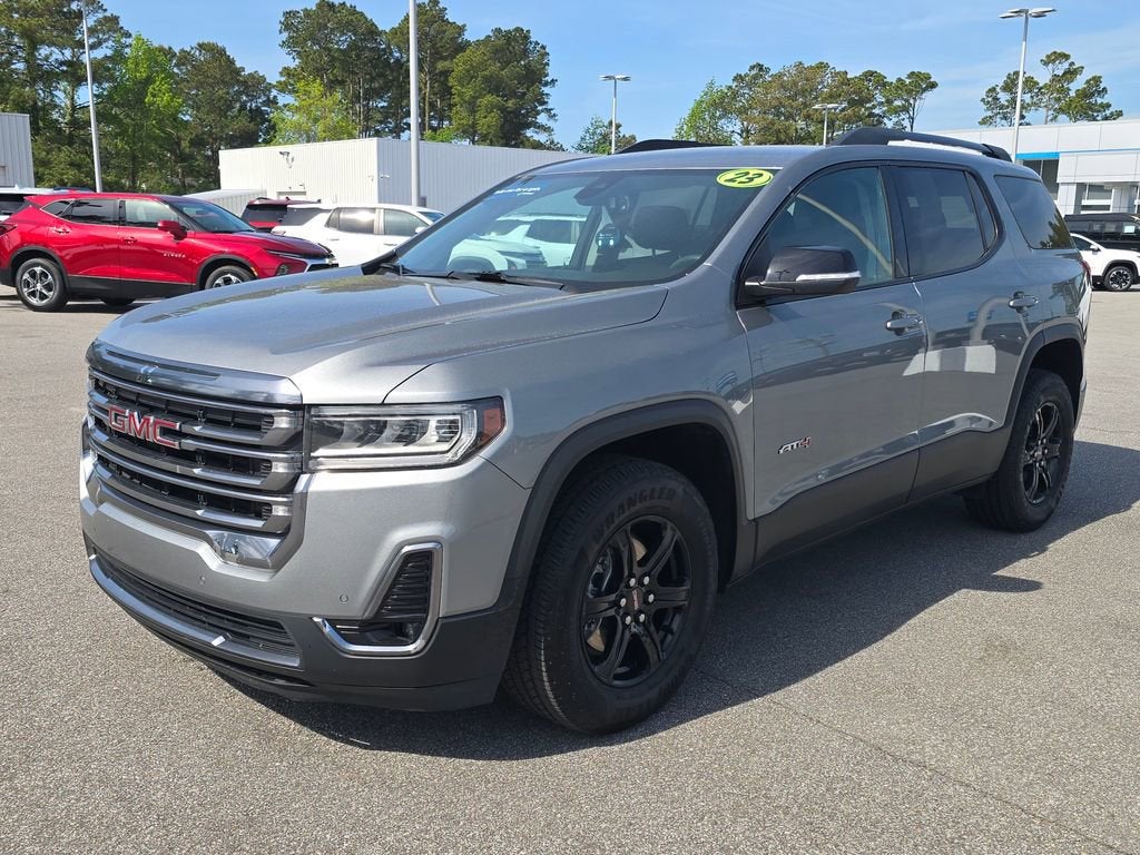 2023 GMC Acadia AT4 in Sterling Metallic — front three-quarter view
