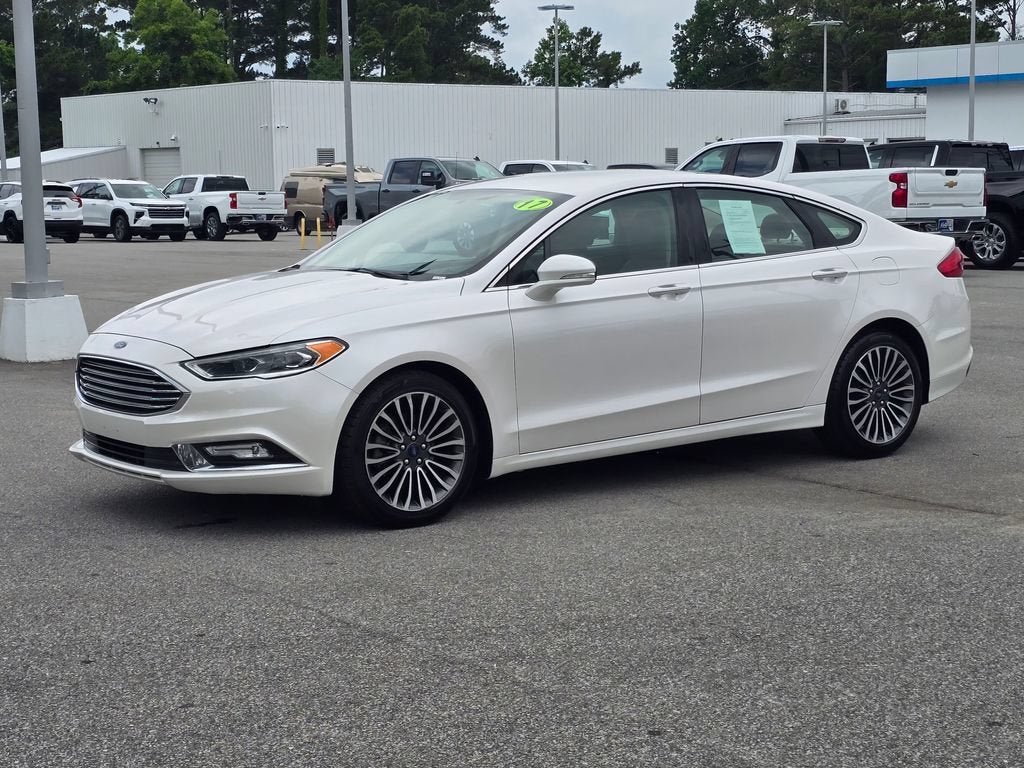 2017 Ford Fusion SE in White — front three-quarter view