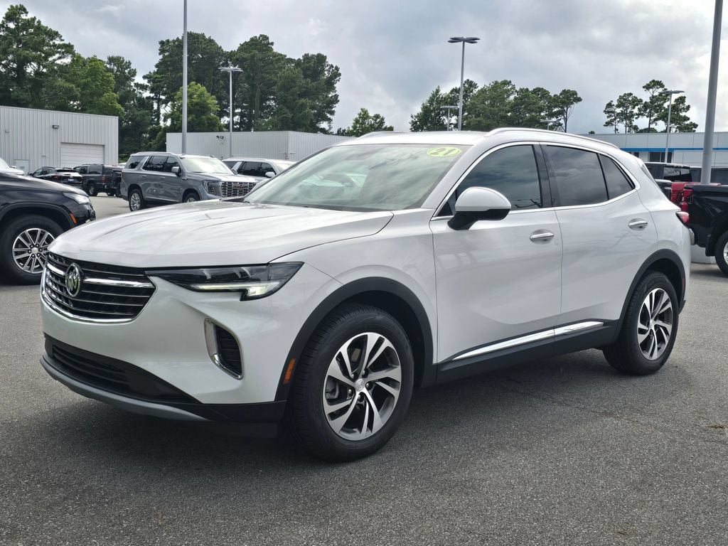 2021 Buick Envision Essence in Summit White — front three-quarter view